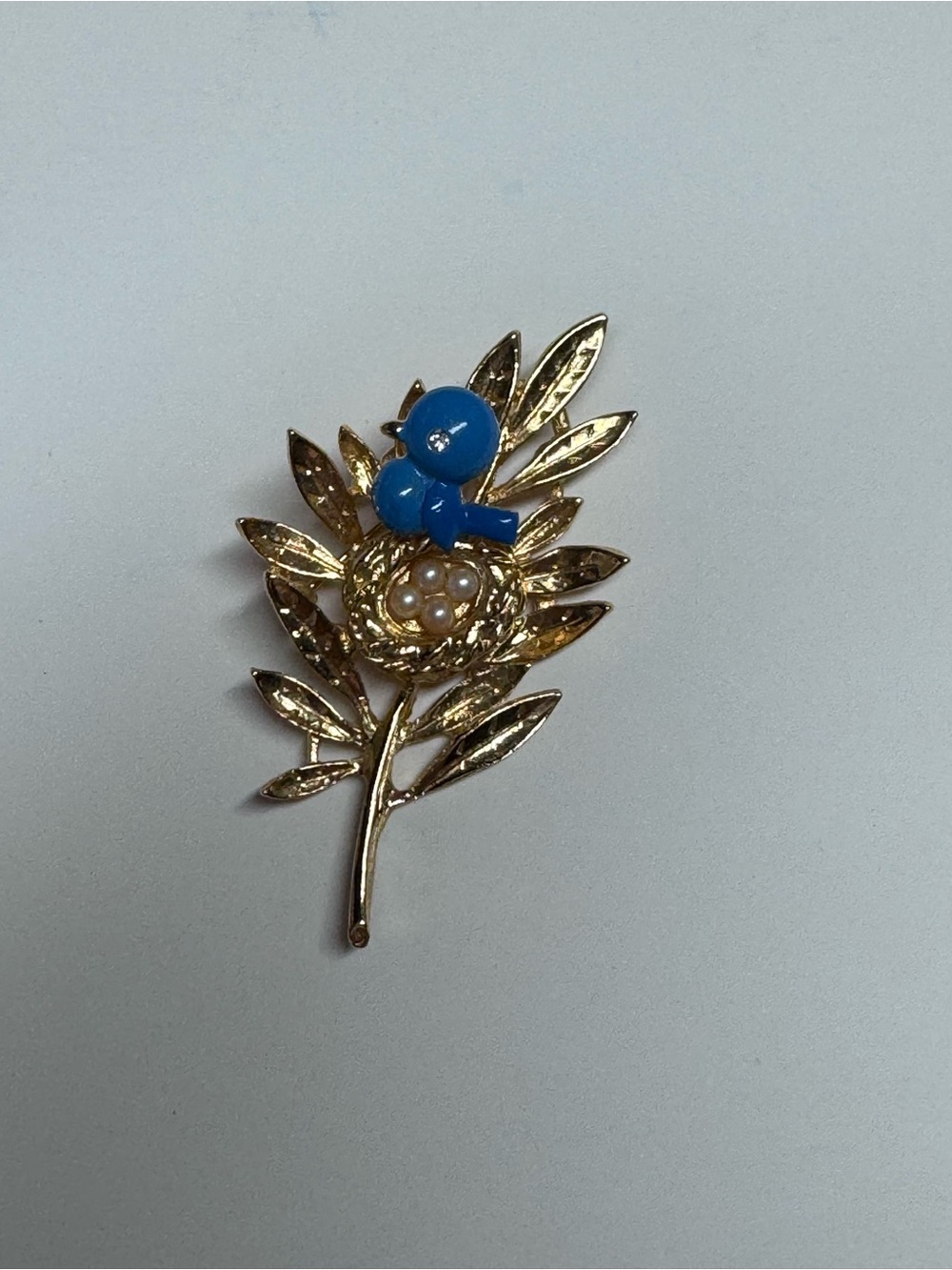 Trifari Vintage Gold Leaf Brooch with Trembler Blue Bird.